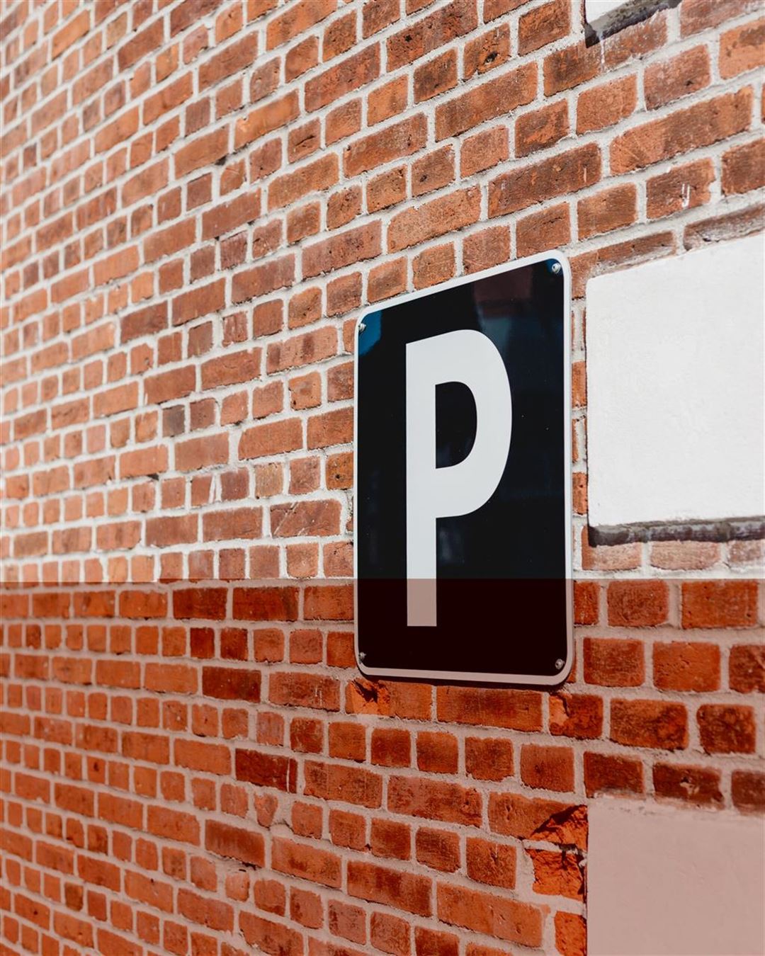 Hvorfor bør du investere i et privat parkerings skilt?